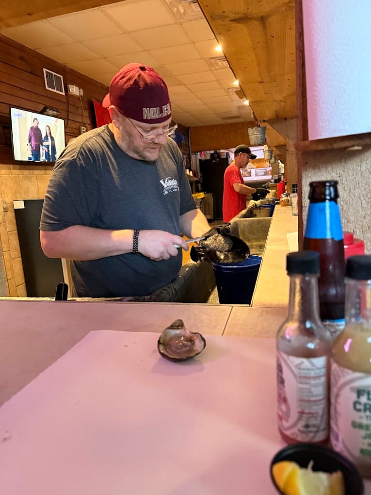 Shucking oysters at the bar