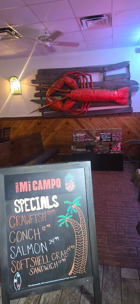 Specials chalkboard under the giant mounted lobster