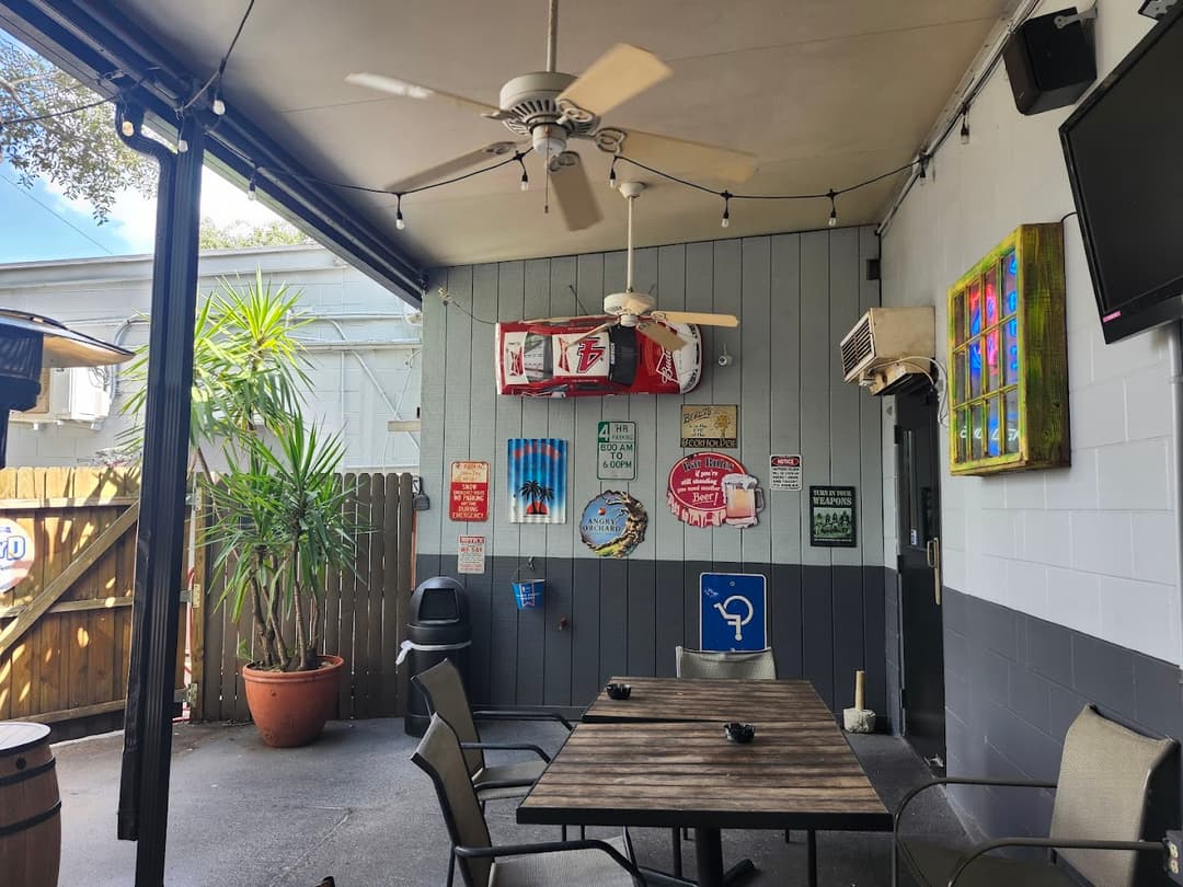 Covered patio with beer signs