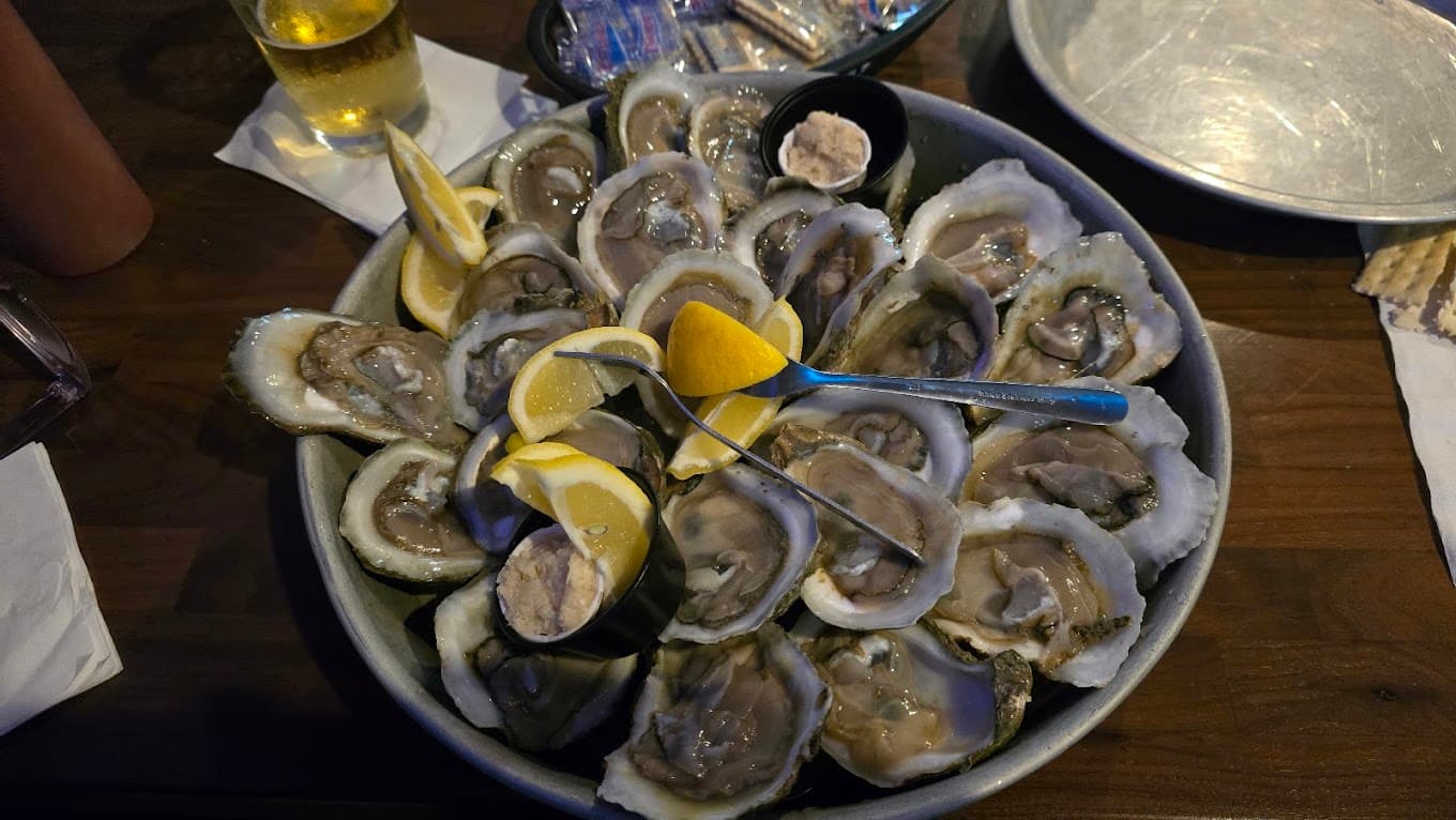 A bowl of fresh raw oysters